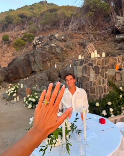Carmen Montero Mundt wearing her oval yellow diamond engagement ring from George Russell
